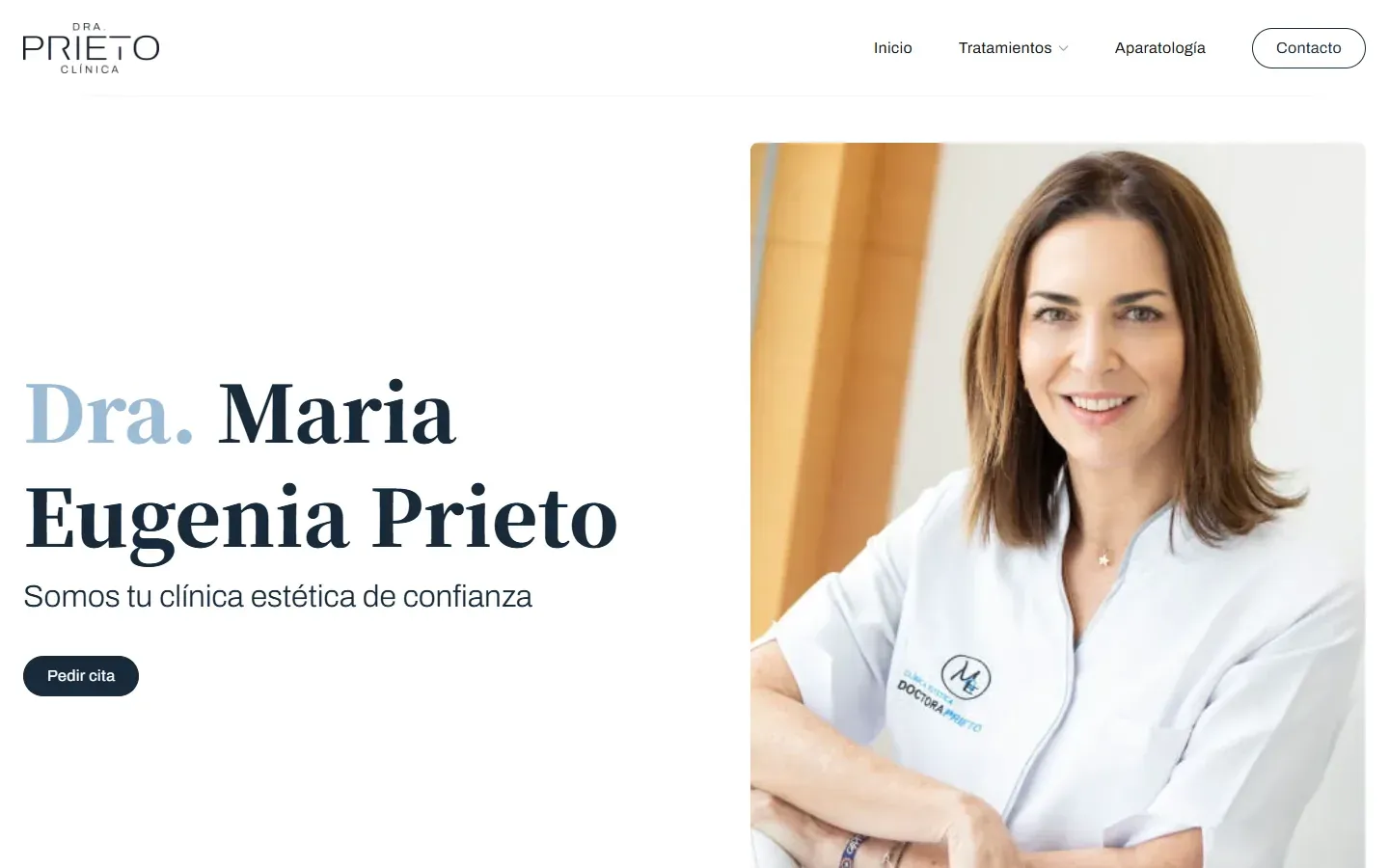 Portada de la web de la Clínica Dra. Prieto con la directora y el botón de pedir cita