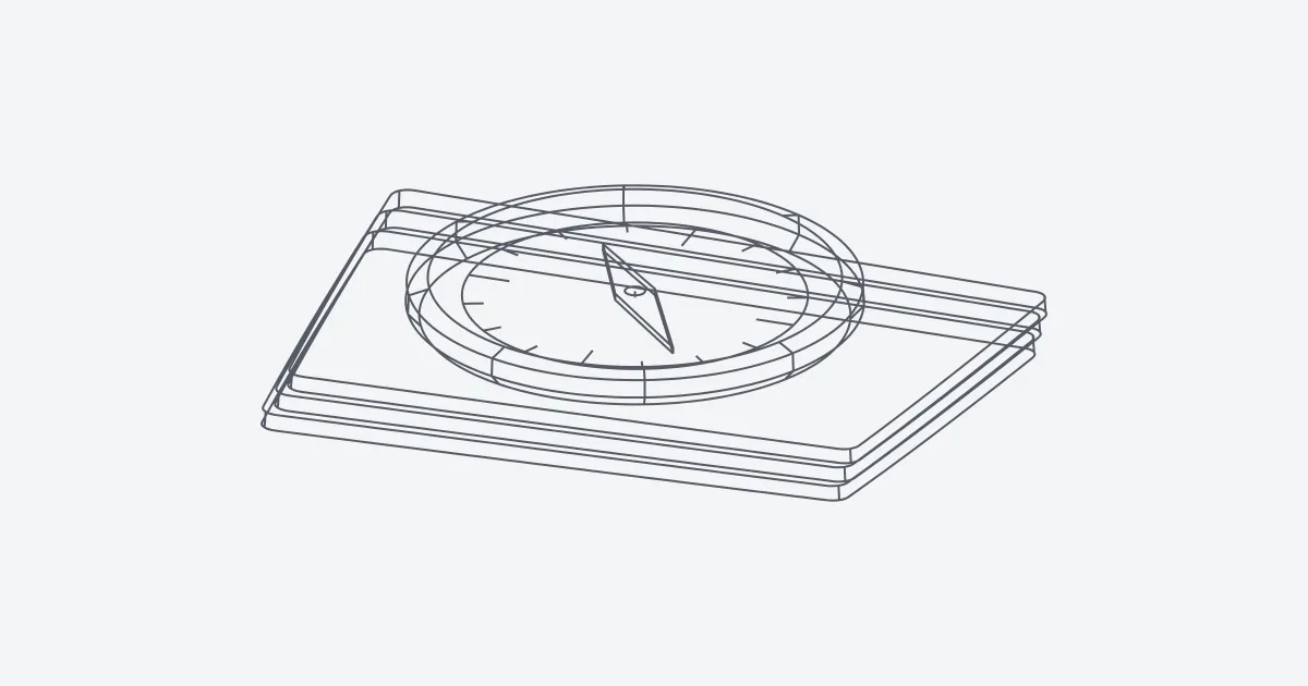 Una brújula en 3D sobre una pila de páginas